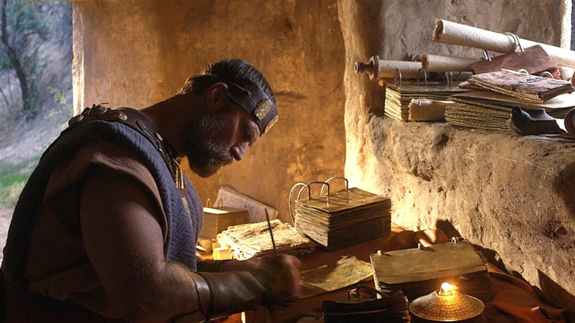 Mormon writes on gold plates. Image from Book of Mormon Videos of The Church of Jesus Christ of Latter-day Saints