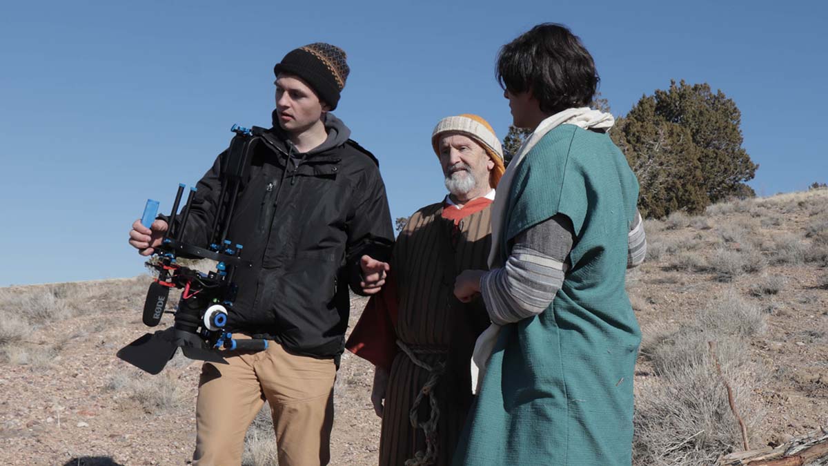 Taylor Riley *director) gives direction to actors Karl Young and Sean Acebal.