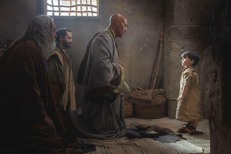 Wise men kneel before the Christ child. Image via comeuntochrist.org.
