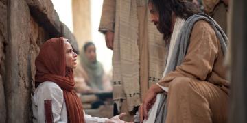Jesus heals a woman with an issue of blood. Image via lds.org