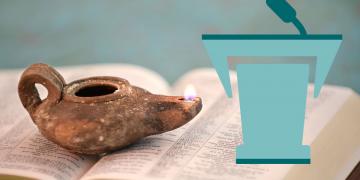 Ancient oil lamp on open bible. Image by R. Gino Santa Maria via Adobe Stock